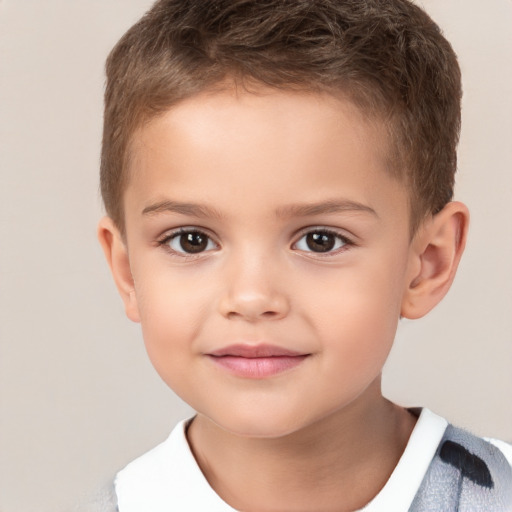 Joyful white child male with short  brown hair and brown eyes