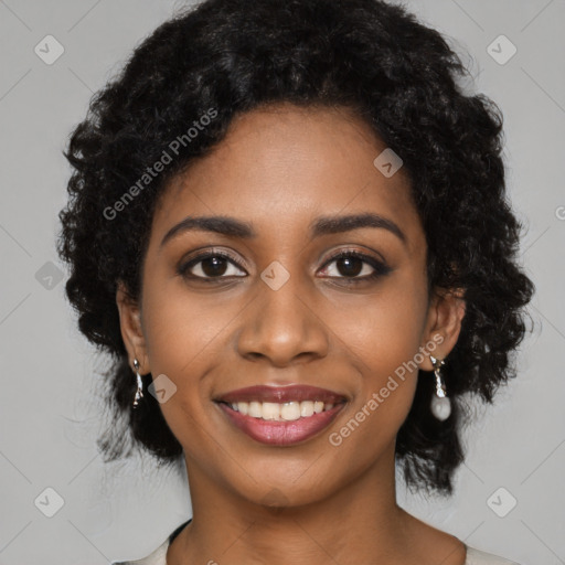 Joyful black young-adult female with medium  black hair and brown eyes