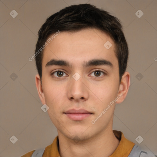 Neutral white young-adult male with short  brown hair and brown eyes