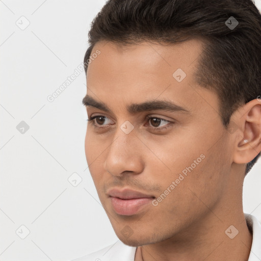 Neutral white young-adult male with short  brown hair and brown eyes