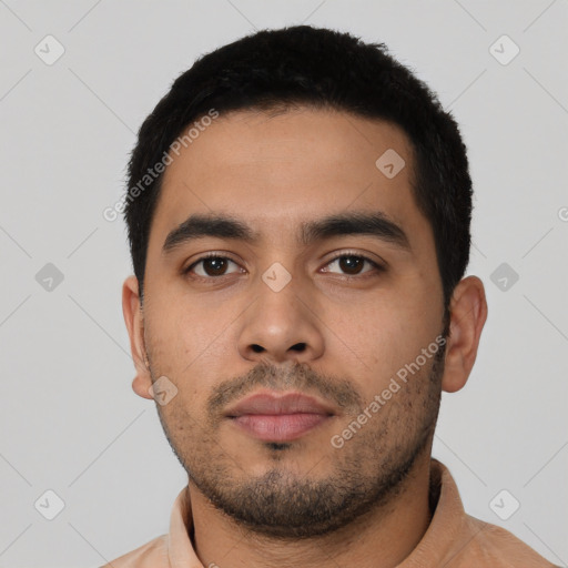 Neutral latino young-adult male with short  black hair and brown eyes