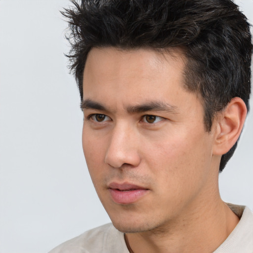 Neutral white young-adult male with short  black hair and brown eyes