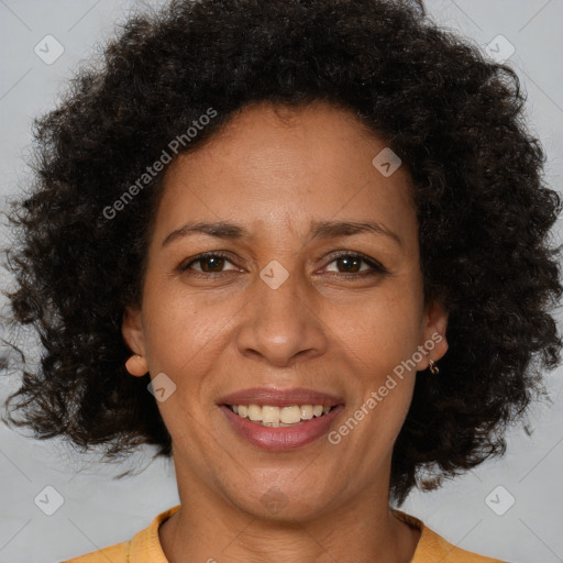 Joyful black adult female with short  brown hair and brown eyes