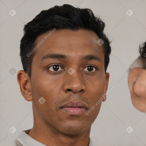 Neutral black young-adult male with short  brown hair and brown eyes