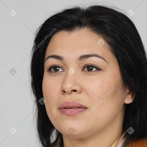 Joyful asian young-adult female with long  brown hair and brown eyes