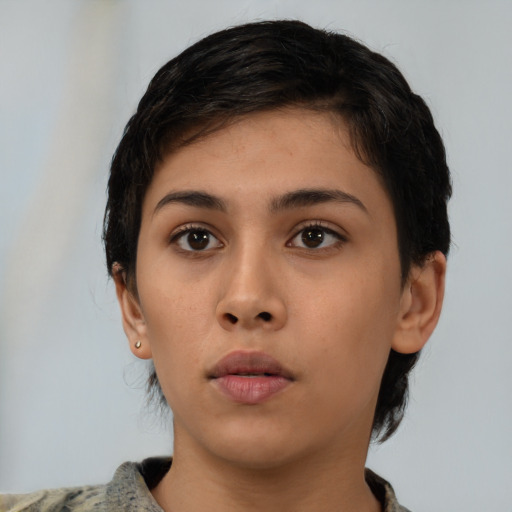 Neutral latino young-adult female with medium  black hair and brown eyes