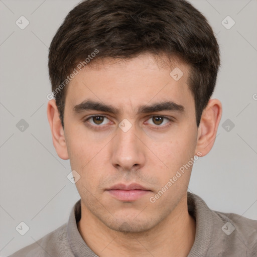 Neutral white young-adult male with short  brown hair and brown eyes