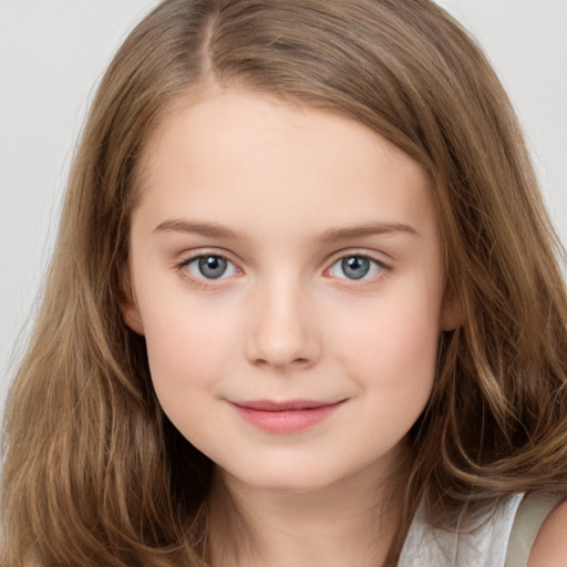 Joyful white child female with long  brown hair and brown eyes