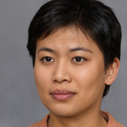 Joyful asian young-adult female with short  brown hair and brown eyes