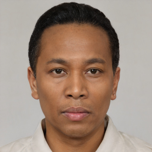 Neutral black young-adult male with short  black hair and brown eyes