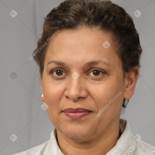 Joyful white adult female with short  brown hair and brown eyes