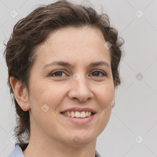 Joyful white adult female with short  brown hair and brown eyes