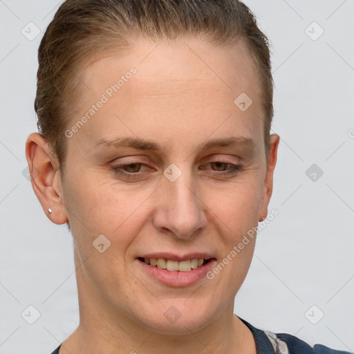 Joyful white adult female with short  brown hair and grey eyes