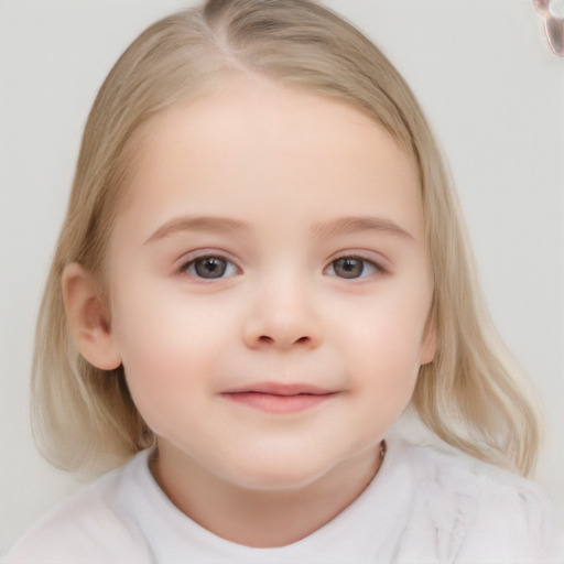 Joyful white child female with medium  brown hair and grey eyes