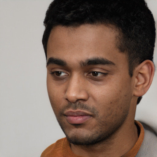 Neutral latino young-adult male with short  black hair and brown eyes
