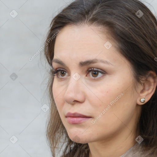 Neutral white young-adult female with medium  brown hair and brown eyes