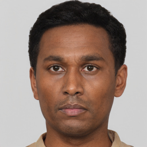 Neutral black adult male with short  black hair and brown eyes