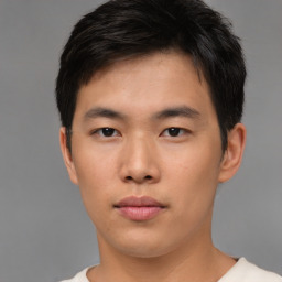 Neutral asian young-adult male with short  brown hair and brown eyes