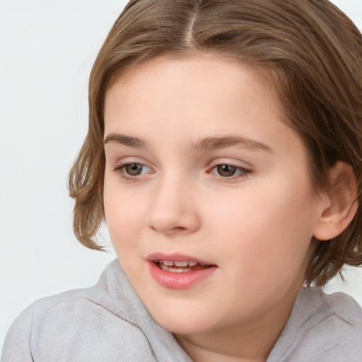 Joyful white child female with medium  brown hair and brown eyes