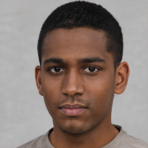 Neutral black young-adult male with short  black hair and brown eyes
