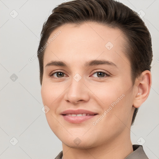 Joyful white young-adult female with short  brown hair and brown eyes