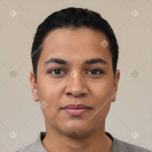 Joyful latino young-adult male with short  black hair and brown eyes