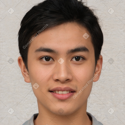 Joyful asian young-adult male with short  brown hair and brown eyes