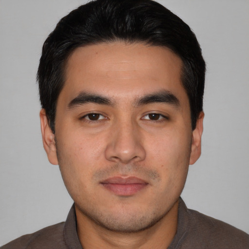 Neutral white young-adult male with short  black hair and brown eyes