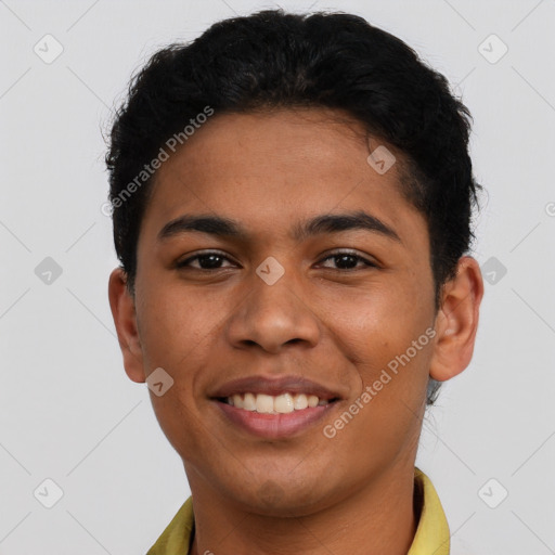 Joyful latino young-adult male with short  brown hair and brown eyes