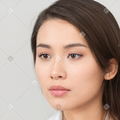 Neutral white young-adult female with long  brown hair and brown eyes