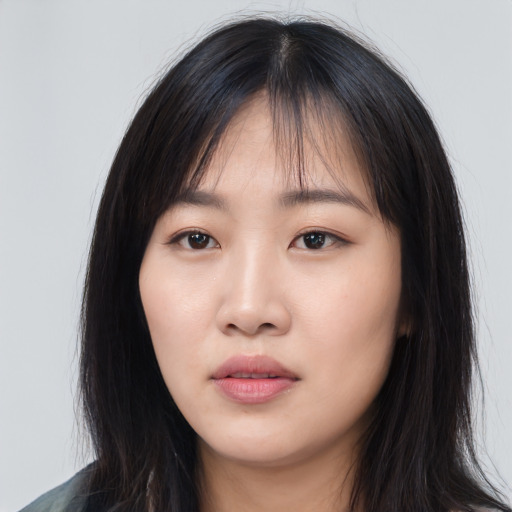 Neutral asian young-adult female with long  brown hair and brown eyes