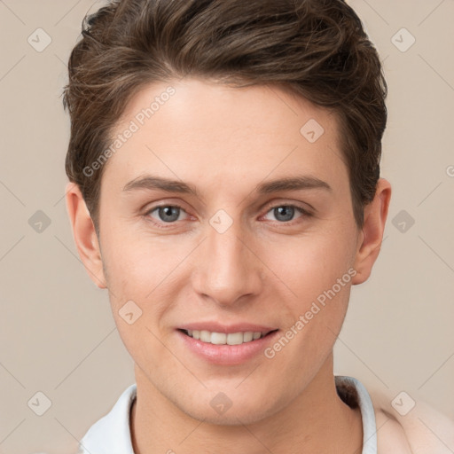 Joyful white young-adult female with short  brown hair and grey eyes