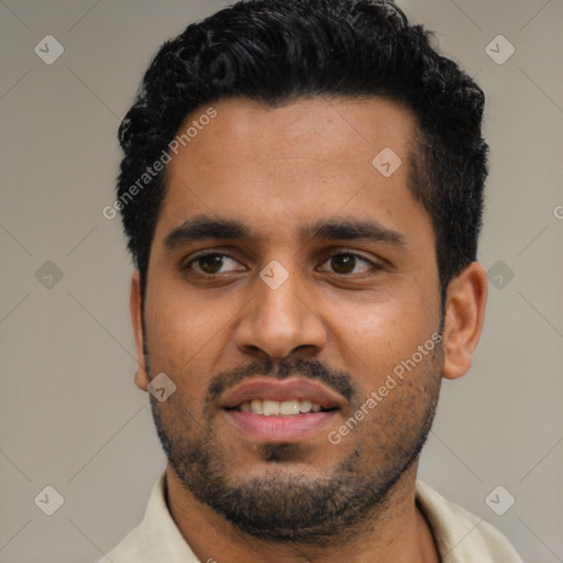 Joyful black young-adult male with short  black hair and brown eyes