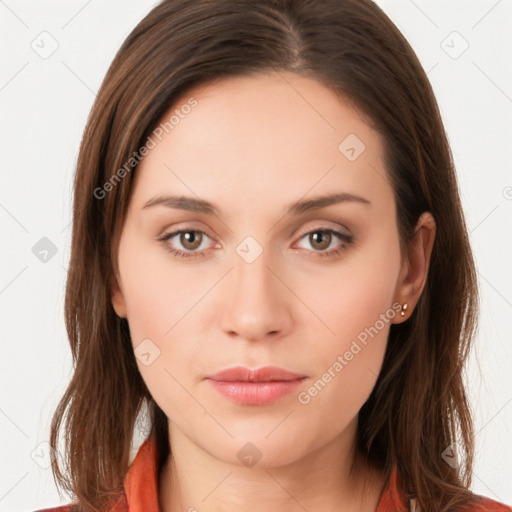 Neutral white young-adult female with long  brown hair and brown eyes