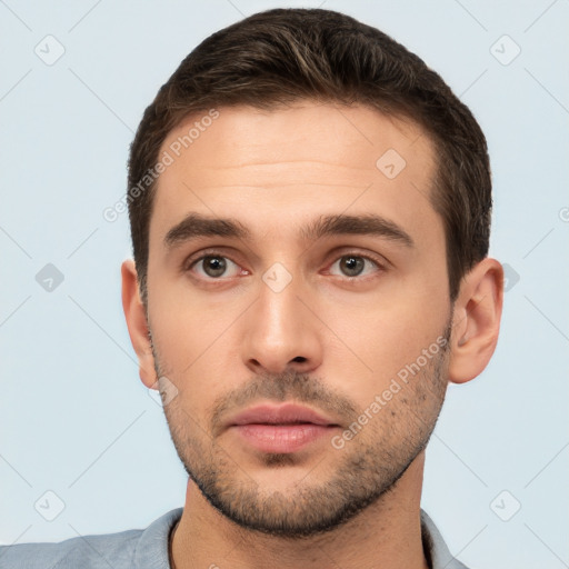 Neutral white young-adult male with short  brown hair and brown eyes