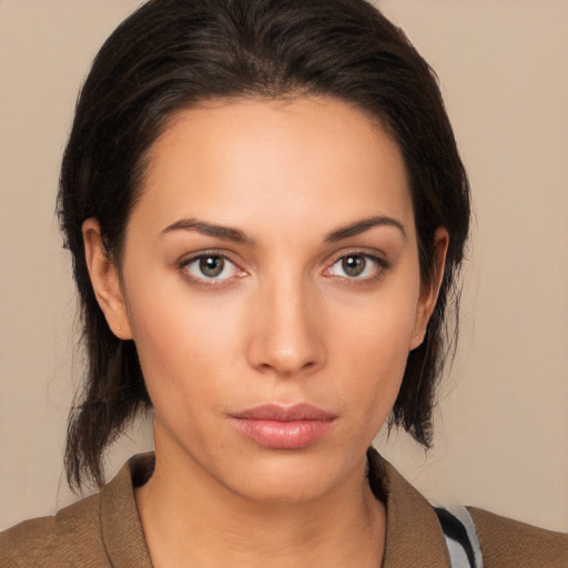 Neutral white young-adult female with medium  brown hair and brown eyes