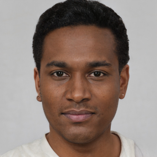 Neutral black young-adult male with short  black hair and brown eyes
