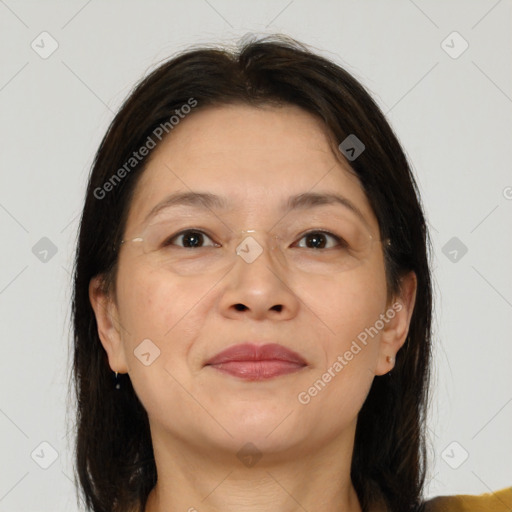 Joyful white adult female with medium  brown hair and brown eyes