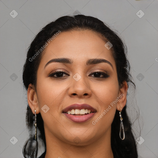 Joyful latino young-adult female with long  brown hair and brown eyes