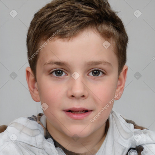 Joyful white child male with short  brown hair and brown eyes