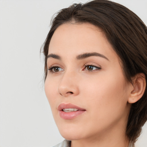 Neutral white young-adult female with medium  brown hair and brown eyes