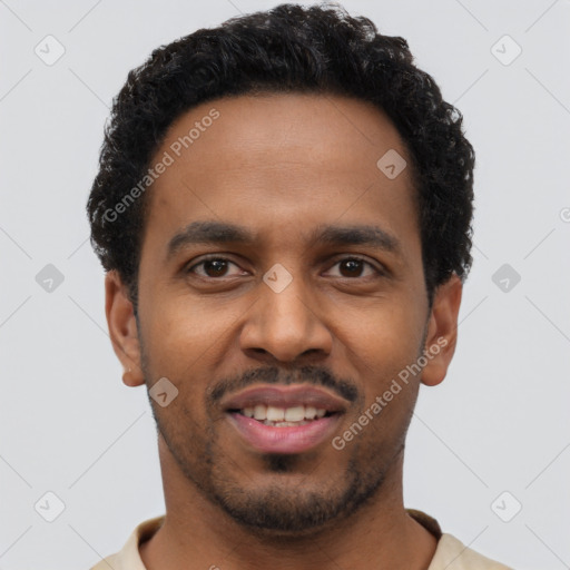 Joyful black young-adult male with short  black hair and brown eyes