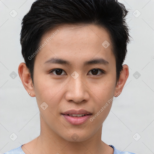 Joyful asian young-adult male with short  brown hair and brown eyes