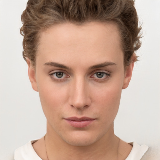 Neutral white young-adult female with short  brown hair and brown eyes