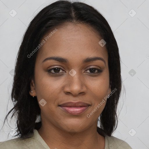 Joyful black young-adult female with medium  brown hair and brown eyes