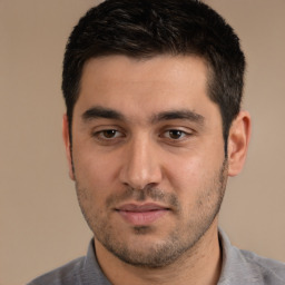 Neutral white young-adult male with short  black hair and brown eyes