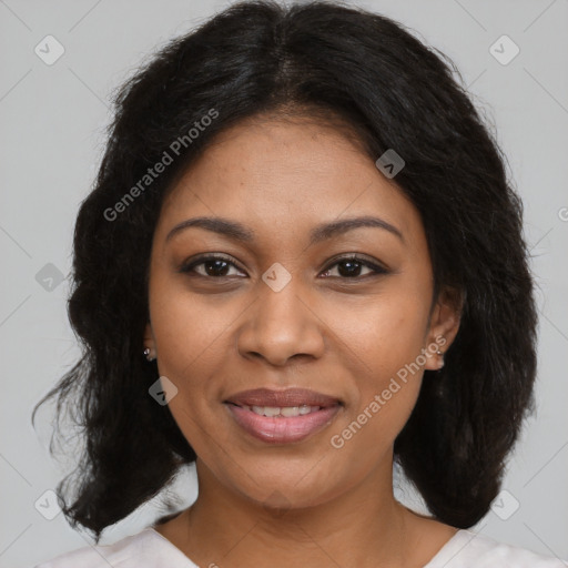 Joyful black young-adult female with medium  brown hair and brown eyes