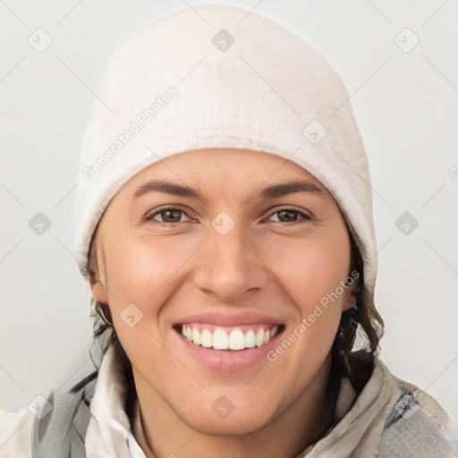 Joyful white young-adult female with medium  brown hair and blue eyes