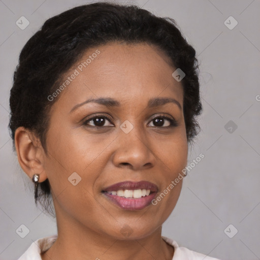 Joyful black young-adult female with medium  brown hair and brown eyes