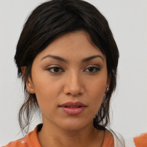 Neutral latino young-adult female with medium  brown hair and brown eyes